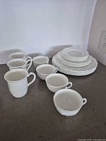 Group view of mugs, teacups and plates