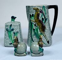 Full set showing pitcher, lidded jar, salt and pepper shakers
