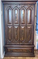 Front view of full armoire