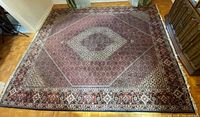Full view of rectangular rug showing overall pattern and colors