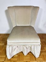 Front view of armless slipper chair