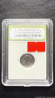 Front view of encapsulated 1943 Lincoln Steel Cent showing coin and INB certification label