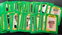 Spread of green-border Baseball's All-Time Greats cards showing quantity and condition