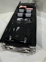 Top view of black Chevrolet convertible decanter showing interior detail