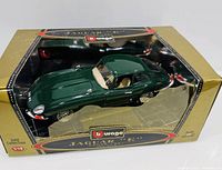 Boxed Burago Jaguar E-Type model car front and top views