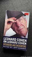 Front cover showing title, editor, colour portrait of Leonard Cohen