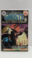 Front cover of Ghosts No.9 showing title, issue number, price, and artwork
