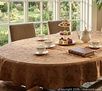 Tablecloth on dining table showing full drape and sheen