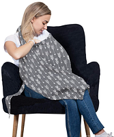 Model demonstrating grey arrow-print nursing cover in use