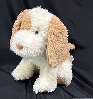 front view of plush dog showing overall design