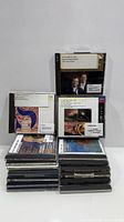 Stack of 18 classical music CDs with visible jewel cases