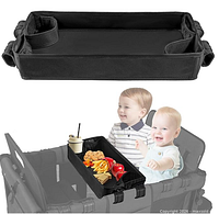 Marketing image showing black snack tray with cup holders mounted in Wonderfold W2 wagon