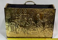 Front view showing full embossed tavern scene with tape measure for scale