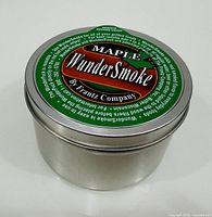 Closed tin with Maple WunderSmoke branding on lid