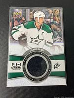 Front view of Jamie Benn Upper Deck Game Jersey card showing player image and jersey swatch