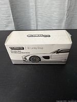 Front of sealed Tarmac Works Global64 Mercedes-Benz SLS AMG Coupe Black Series box