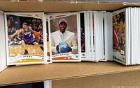 Front view of cards showing Mike Bibby and Julius Hodge cards in box