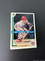 Front view of stacked Upper Deck 1991 baseball cards with Tom Pagnozzi card visible
