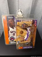 Front view of sealed Vince Carter action figure in packaging