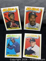 Front view of all four 1988 Topps All-Star cards showing player images and overall condition