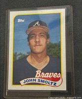 Front of 1989 Topps John Smoltz rookie card in sleeve