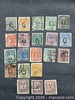 Overview of 20 Peru stamps arranged 5×4 on dark background