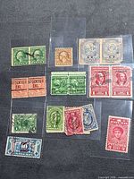 overview of all stamps showing singles, pairs and block