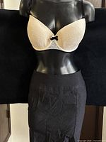 Full view of bra on mannequin with skirt