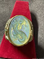 Top view of mermaid cameo ring on presentation stand