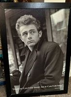 Large framed James Dean portrait behind glass