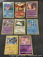 All eight visible Pokémon cards laid out
