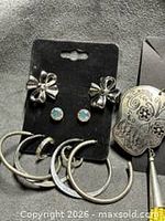 Studs, hoops and part of dangle earrings