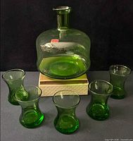 front view of decanter and six glasses