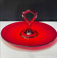 Side angle showing full tray profile and handle