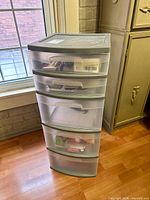 Full front view of the five-drawer plastic organizer