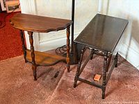 Rectangular drop-leaf table and demilune table side by side