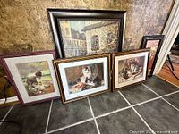 Group shot of five framed prints
