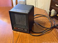 Front view of Honeywell ceramic heater showing grille and indicator lights