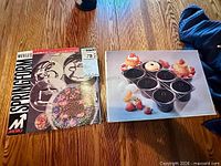 Both boxed kitchenware items side by side on table