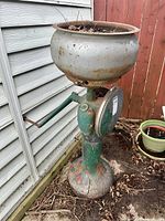 Full view of cream separator showing bowl, body and base