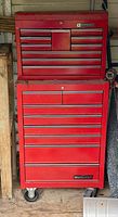 Front view of stacked red Mastercraft chest and cabinet