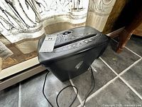 Paper shredder full view with MaxSold tag on top