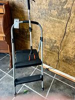 Ladder and grabber together showing overall condition