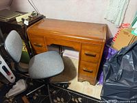 Desk front with drawers and office chair