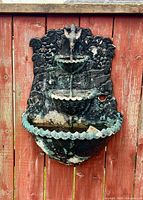 Front view of wall-mount fountain showing full design