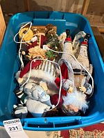 Overall view of tote contents including figurines, plush and decorations