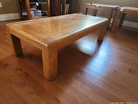 Full view of coffee table in room setting