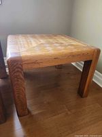 End table angled side view showing legs and grain