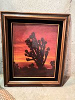 Full view of framed oil painting