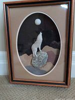 Full view of framed caribou hair tufting artwork